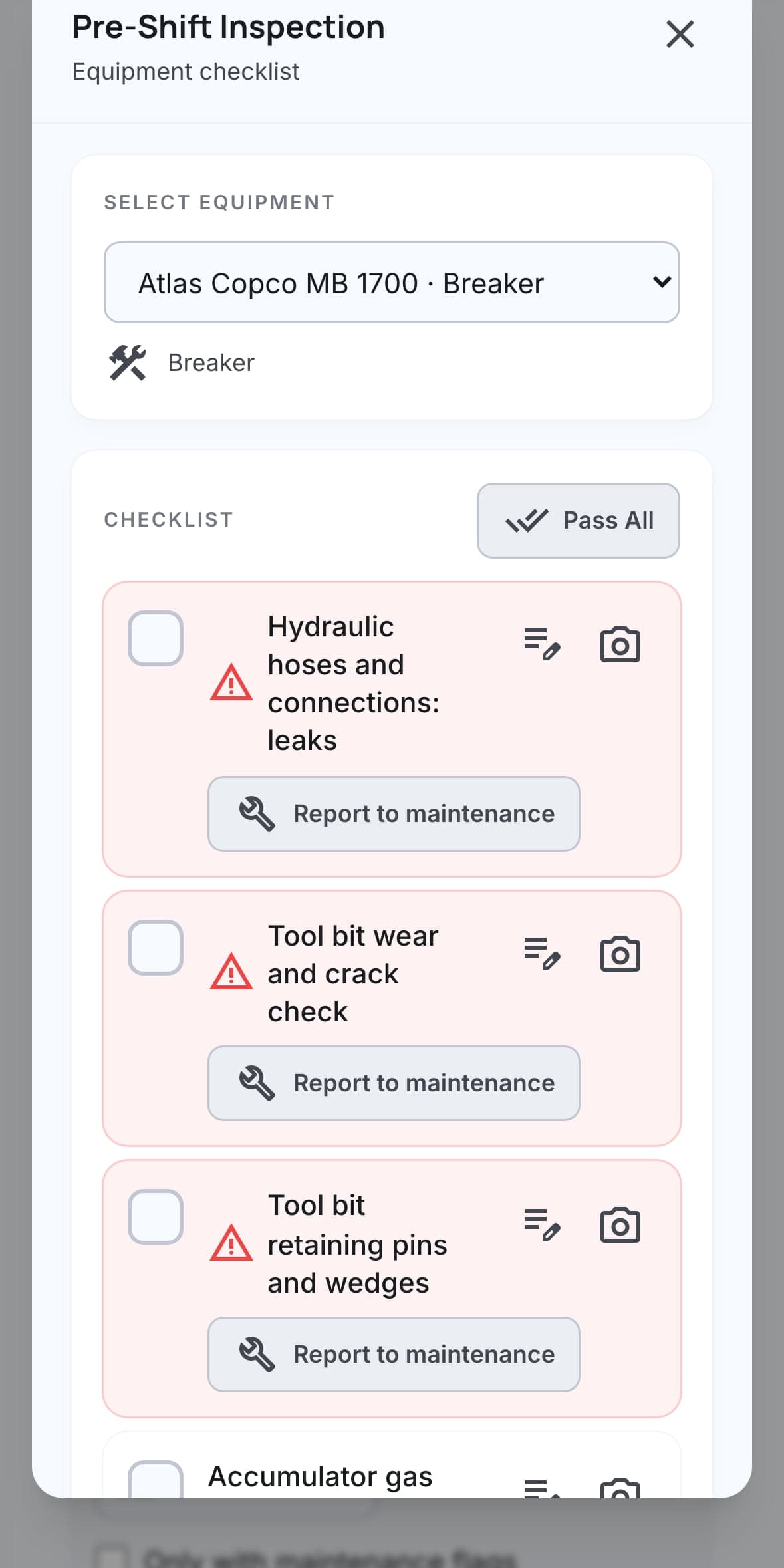 Pre-shift inspection checklist for a breaker, with camera and report-to-maintenance on each item