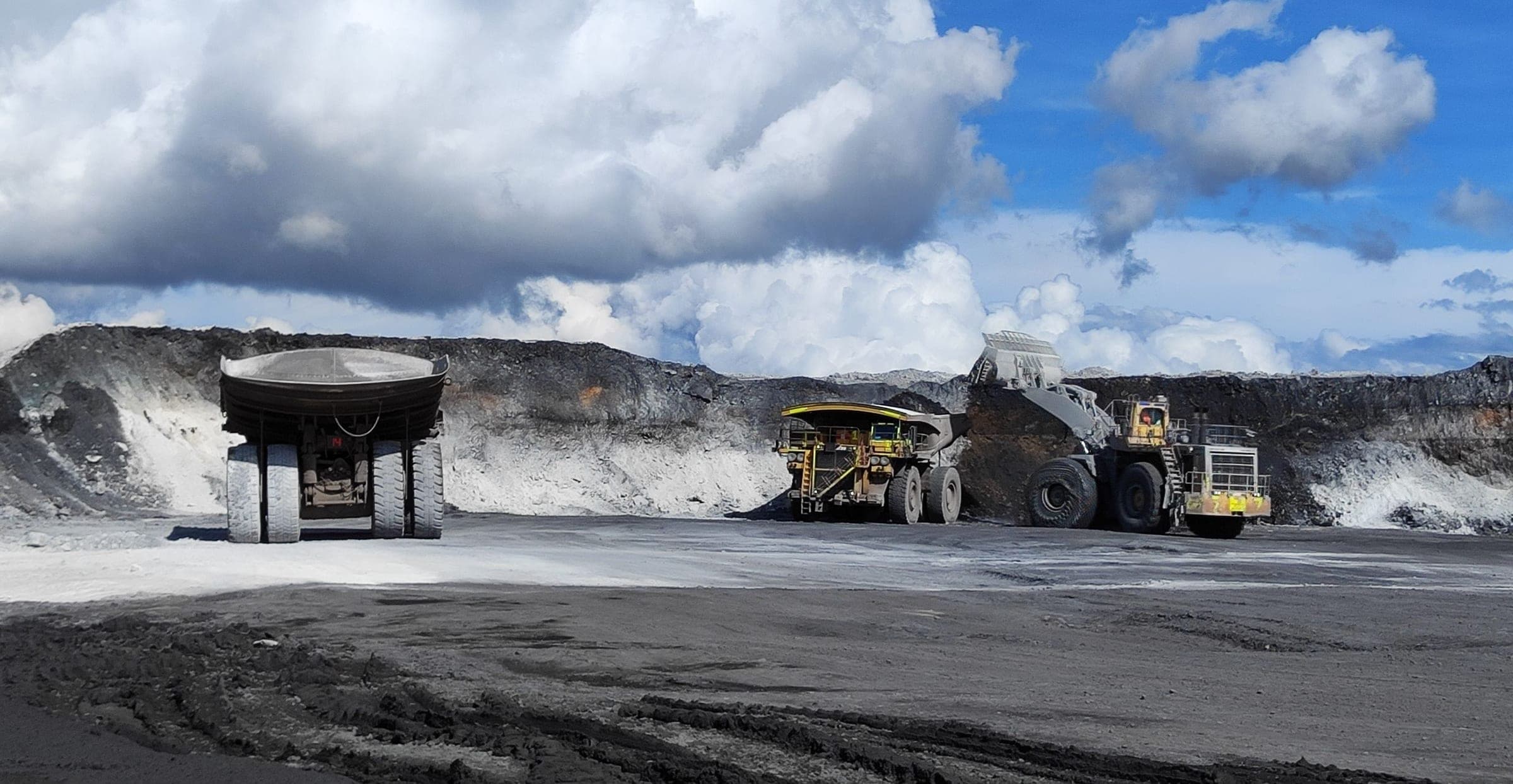 Active limestone quarry with heavy equipment