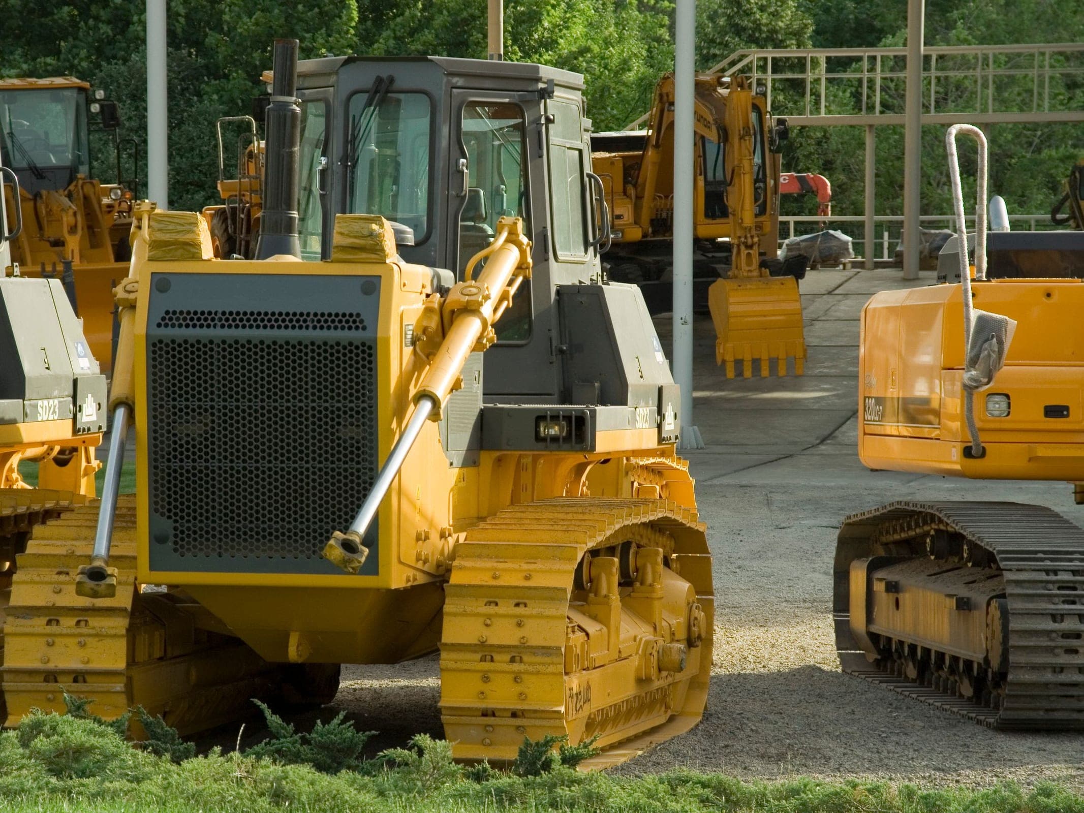 Hydraulic excavator on a construction jobsite at sunrise, representing heavy equipment on rent