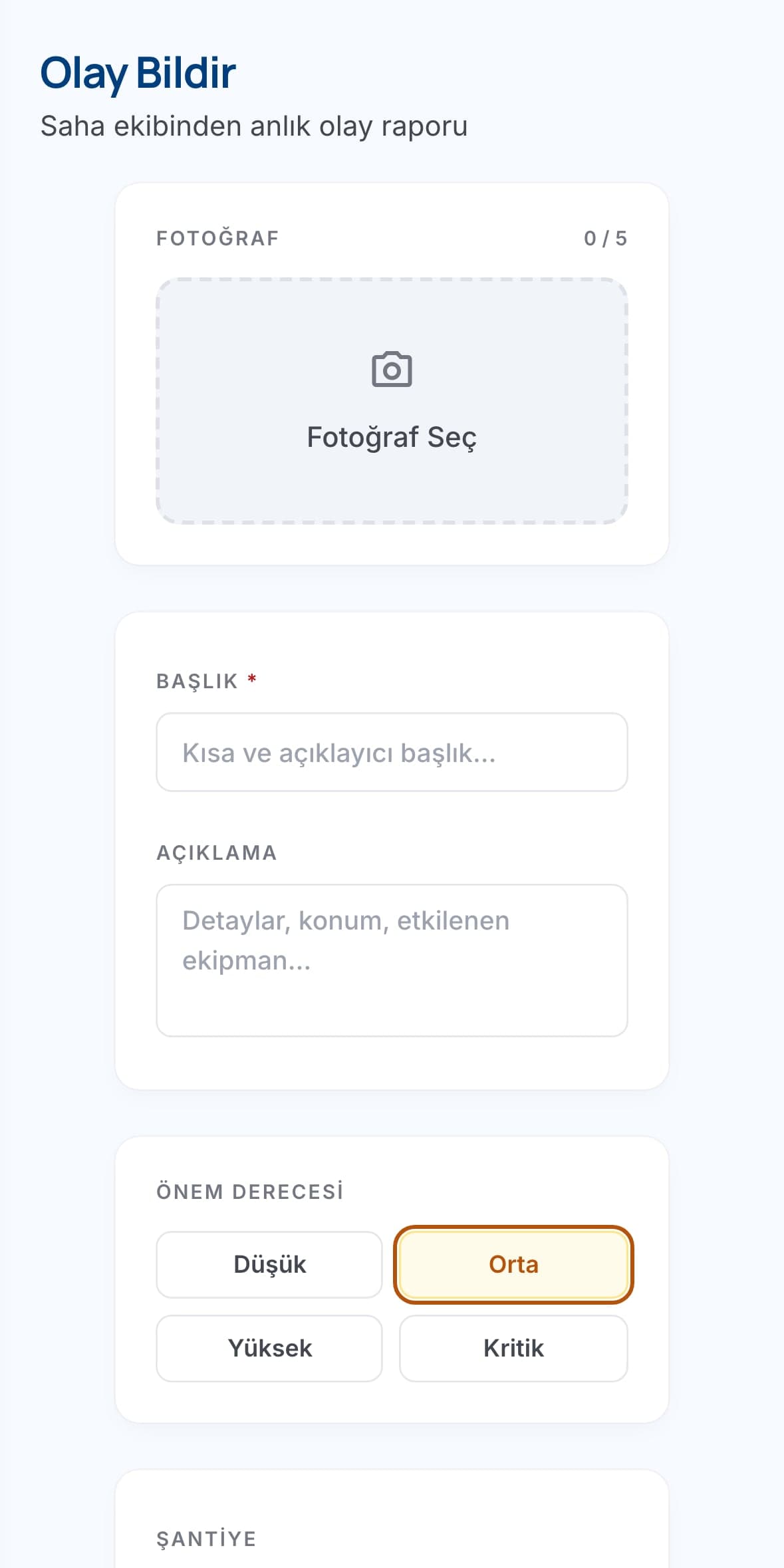 Fotoğraf alanı, açıklama ve önem derecesi seçicisi bulunan saha olayı bildirim ekranı